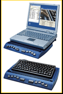 Two Photos of the Braillestar 40 Refreshable Braille Terminal. One with a Laptop docked within it and one with a desktop PC keyboard docked within it.
