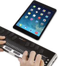 Photo of the Brailliant BI 32-Cell Refreshable Braille Display connecting via Bluetooth to an Apple iPad